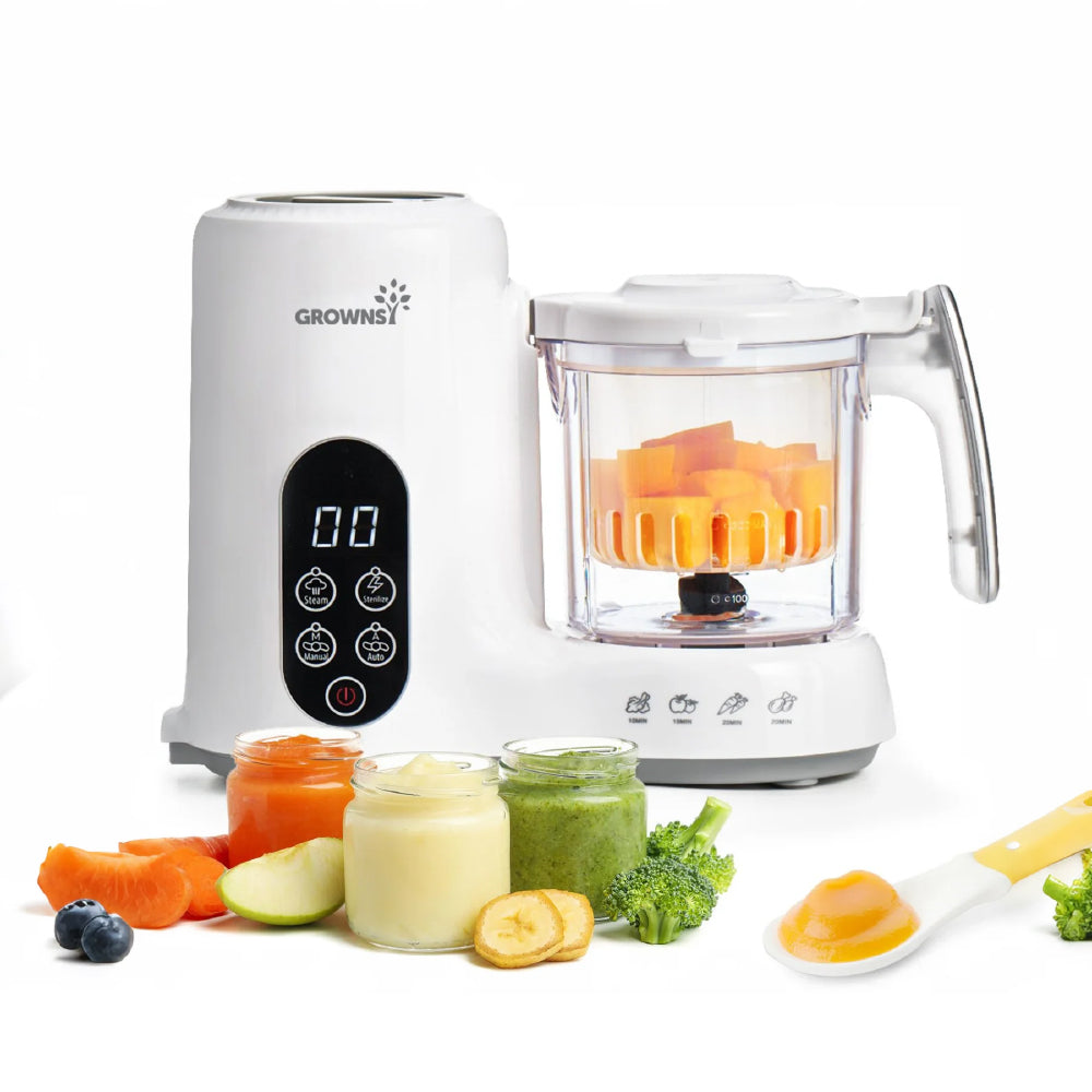 Little Milestones Bundle: White baby food maker with carrots & pureed food jars for baby food prep.