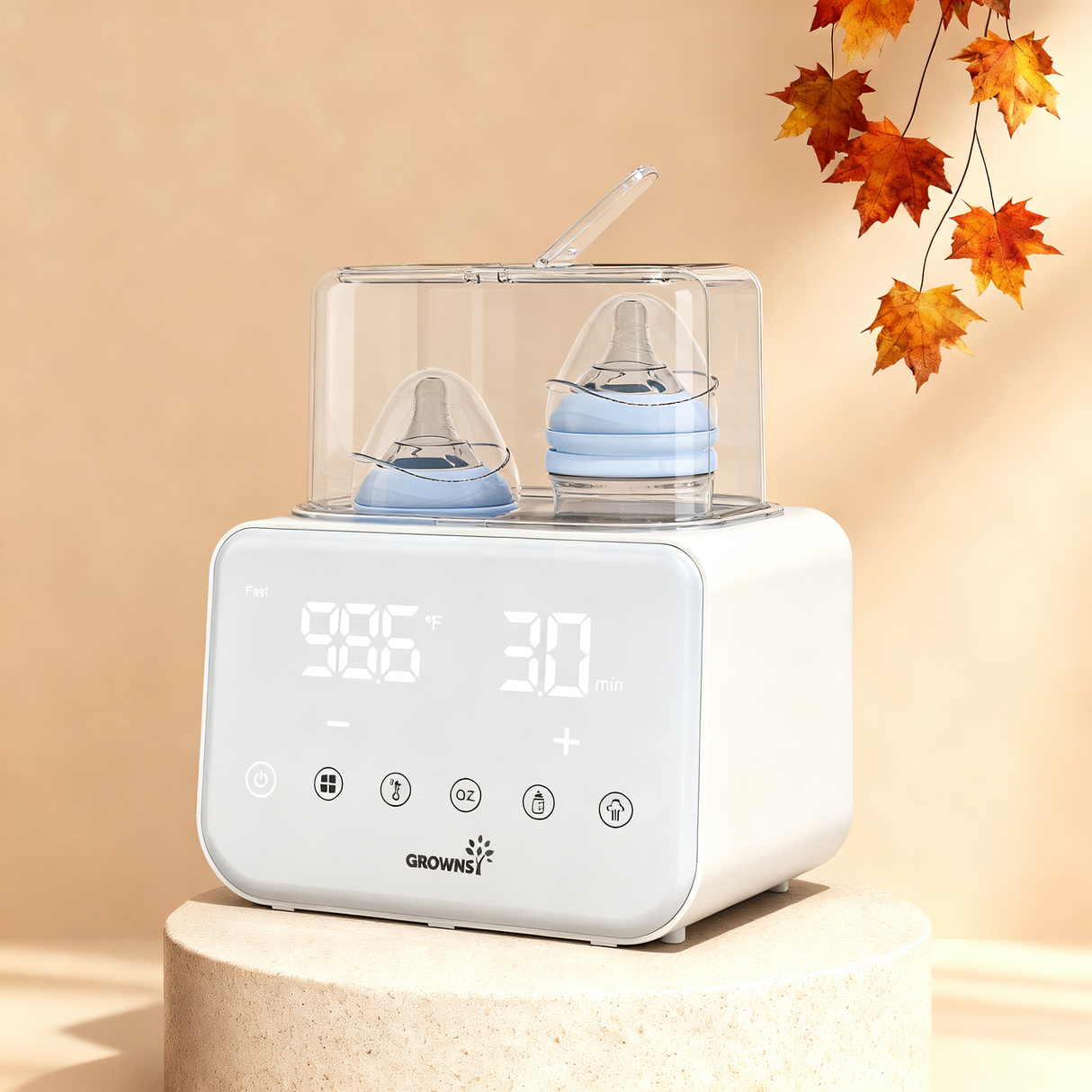 White 10-in-1 baby bottle warmer with double bottle capacity and digital display showing 98.6°F and 30 minutes.