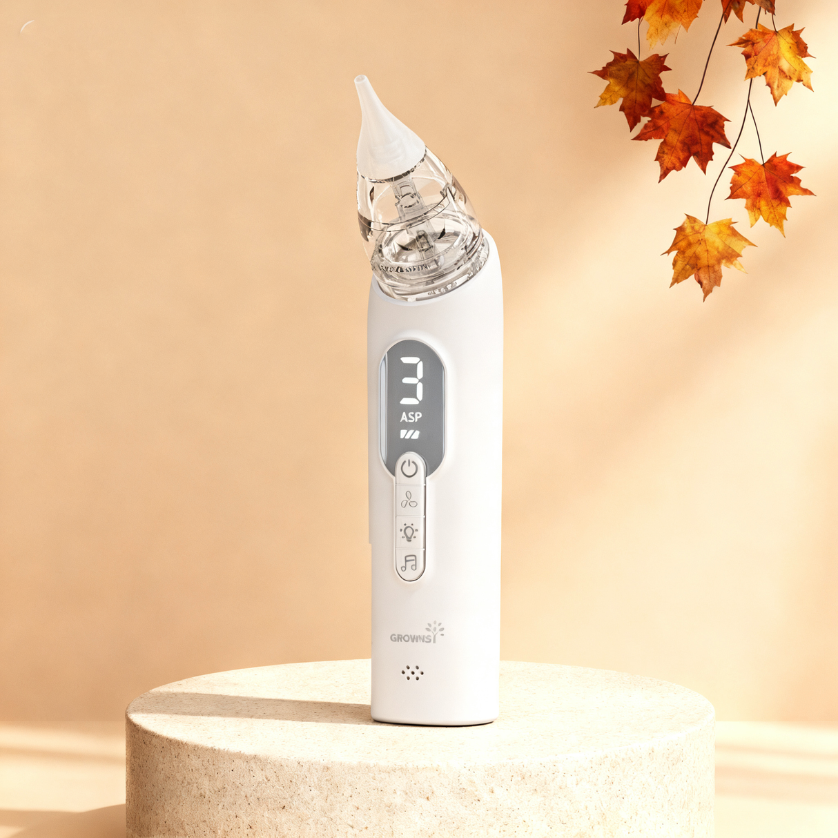 White ergonomic newborn nasal aspirator with digital display and buttons, clear reservoir. E-commerce product shot.