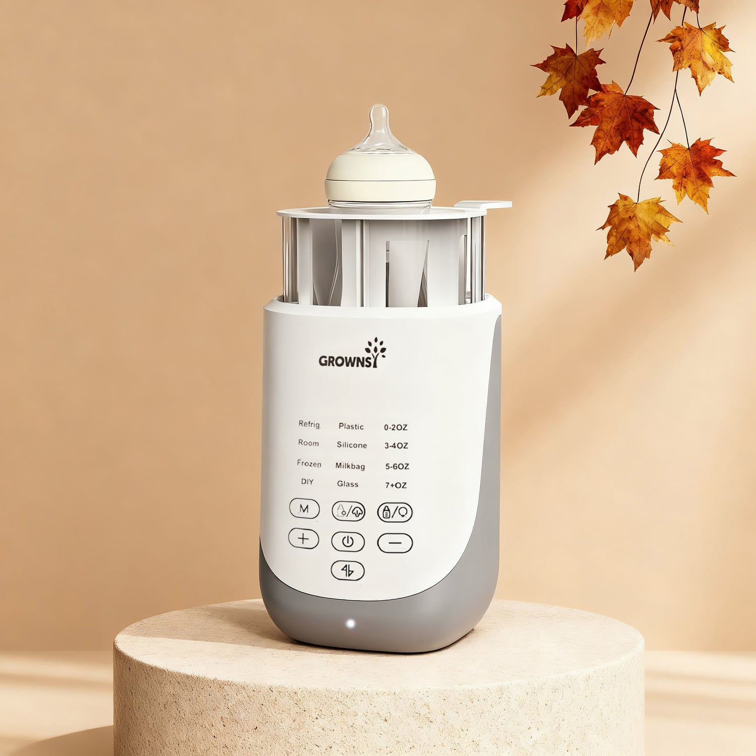 Grownsy 10-in-1 Fast Baby Bottle Warmer with Smart Auto-Lift, white and gray, with bottle on top, showing control panel.