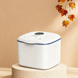 PureRay white cube UV sanitizer with blue trim, 4-in-1 functionality for baby bottles and everyday items.