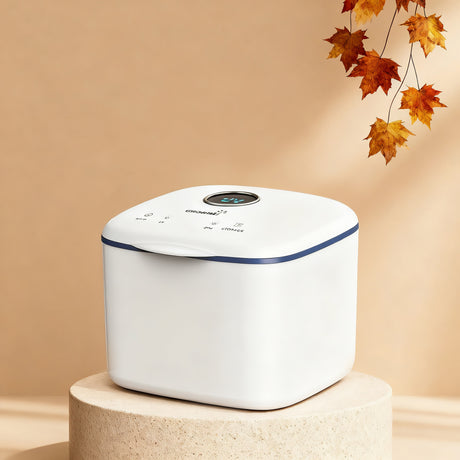 PureRay white cube UV sanitizer with blue trim, 4-in-1 functionality for baby bottles and everyday items.