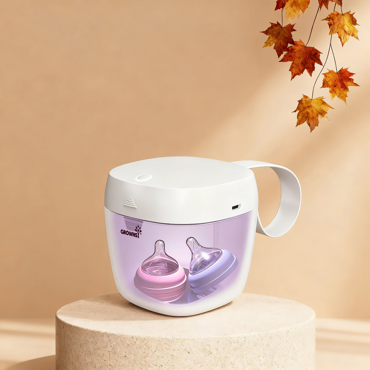 White MiniPure UV Sanitizer with handle, holding pink and purple pacifiers. Portable and effective for baby hygiene.