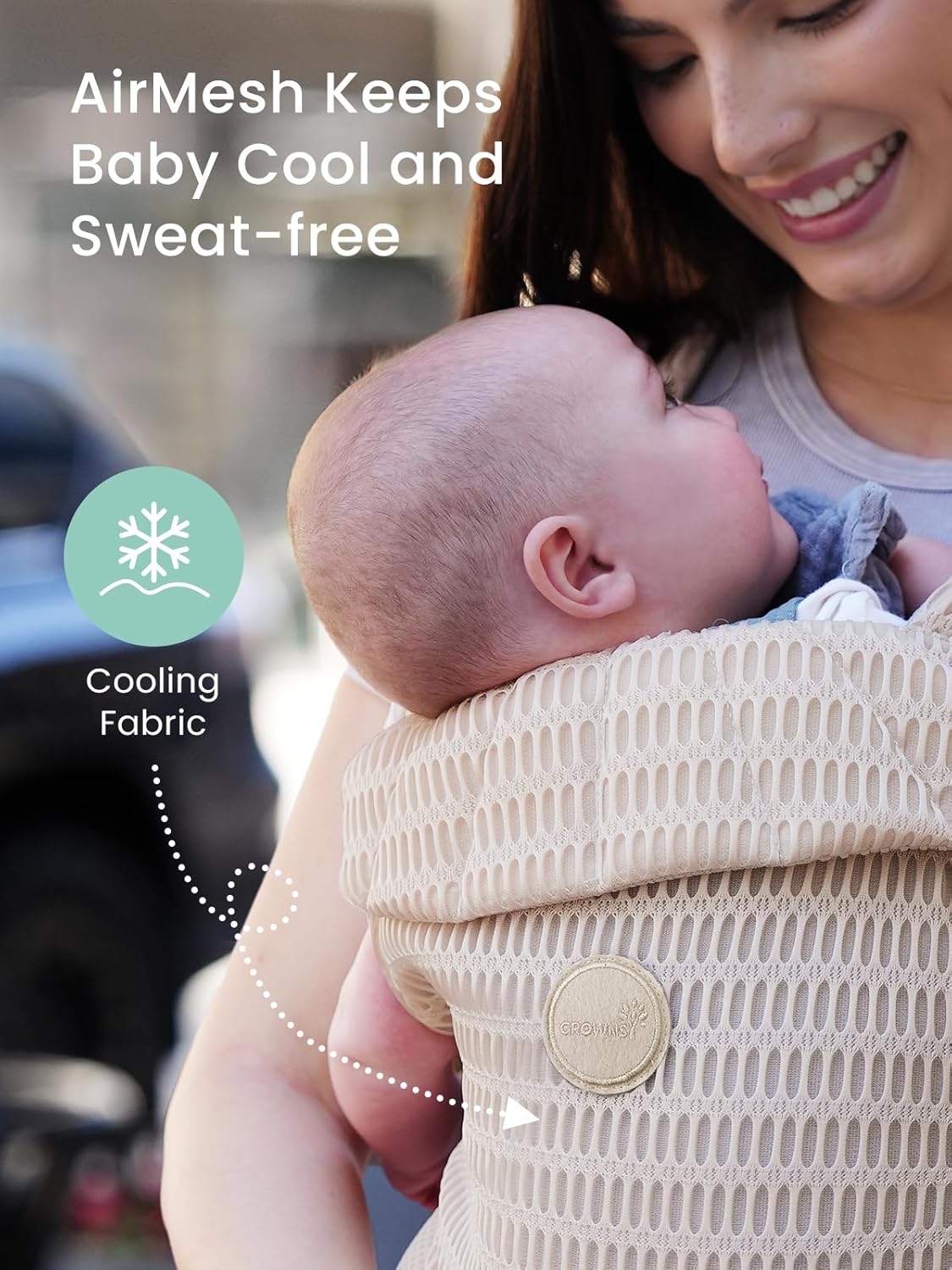 Beige AirMesh baby carrier on woman with baby, highlighting cooling fabric for summer comfort. Breathable & sweat-free.