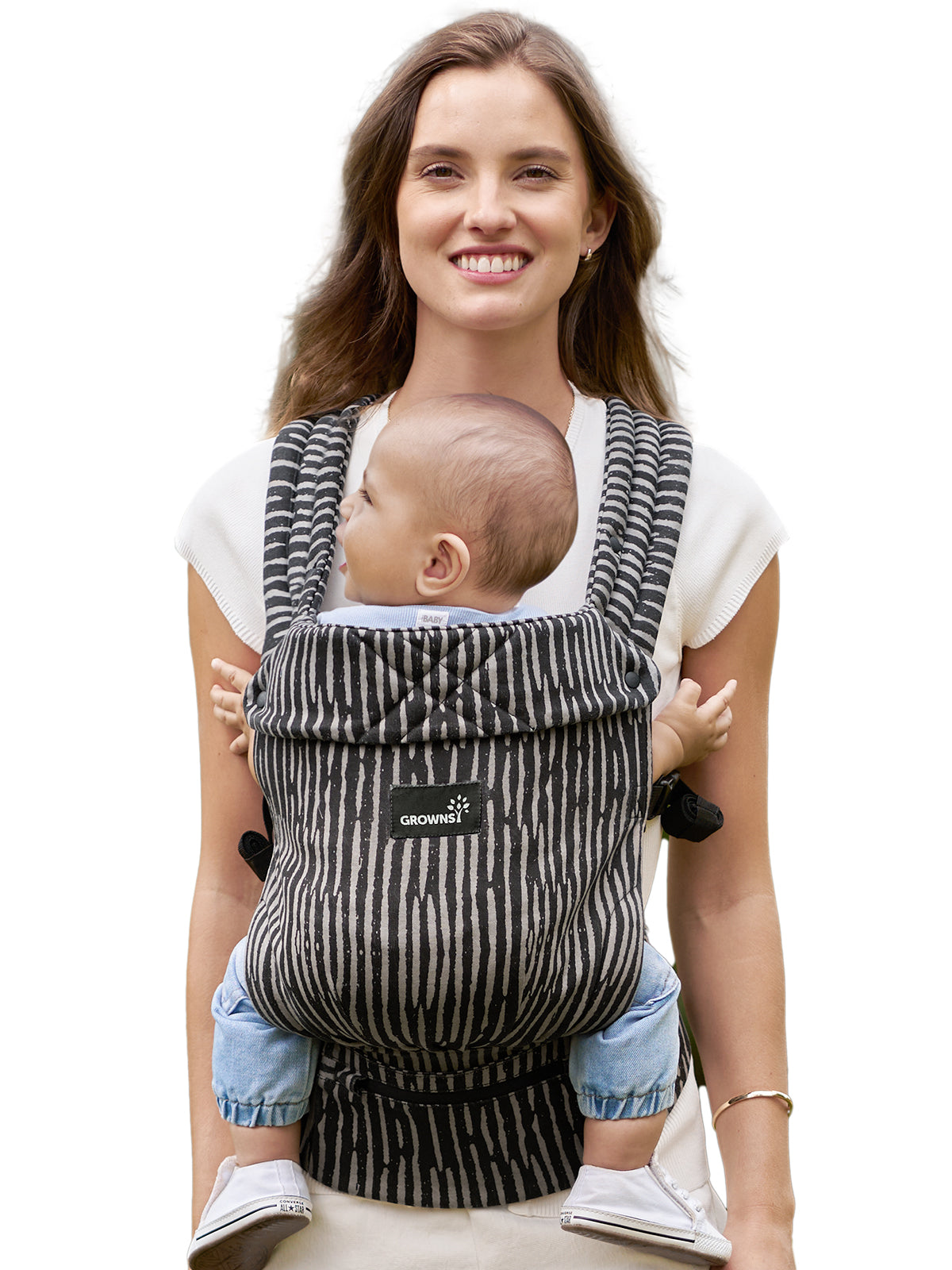 Grownsy Easy-Breezy striped baby carrier with padded straps and hip belt, shown on smiling woman with baby facing out.