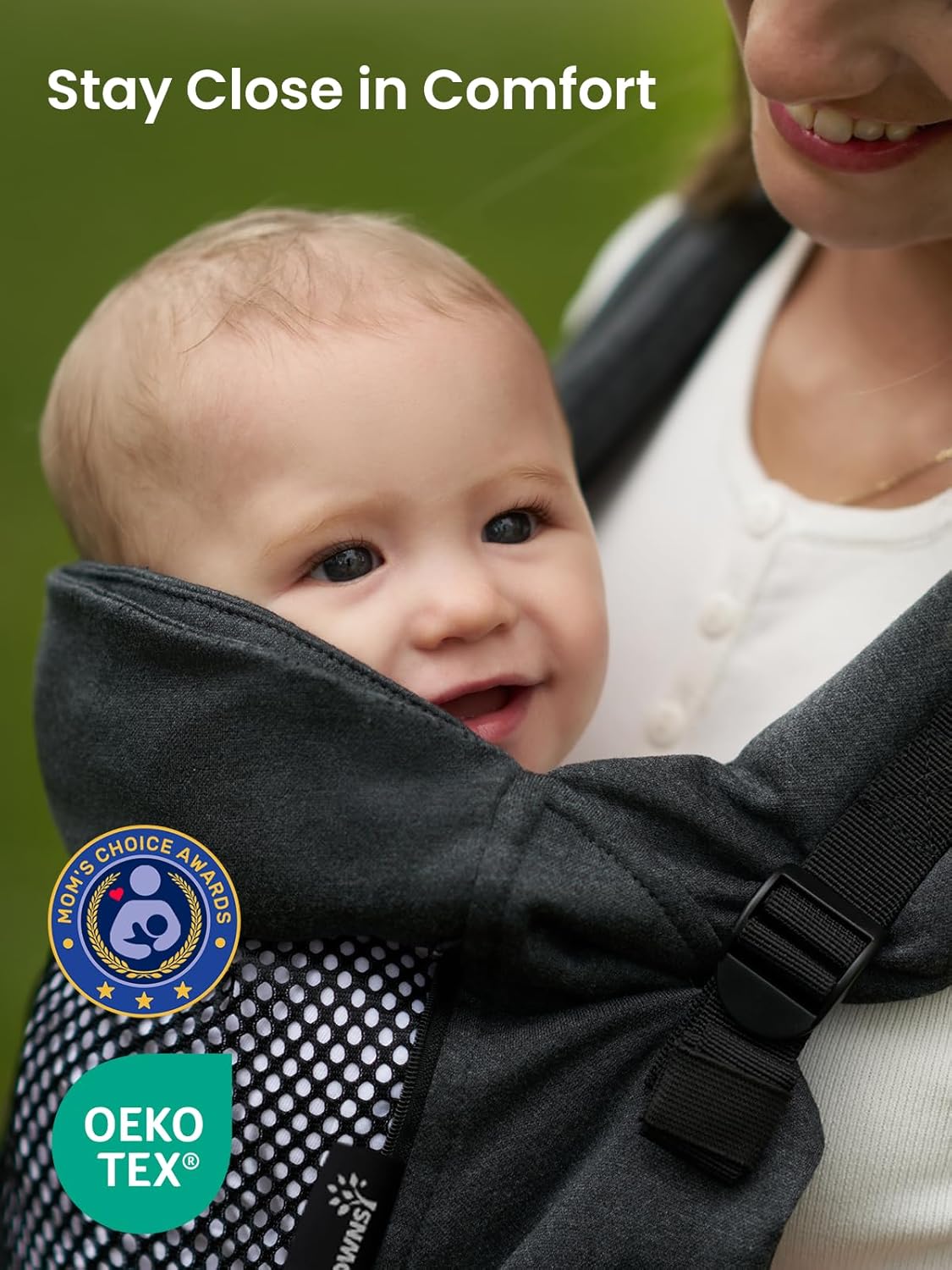 Dark gray ergonomic baby carrier with mesh panel and certified OEKO-TEX & Mom's Choice Awards, featuring smiling baby.
