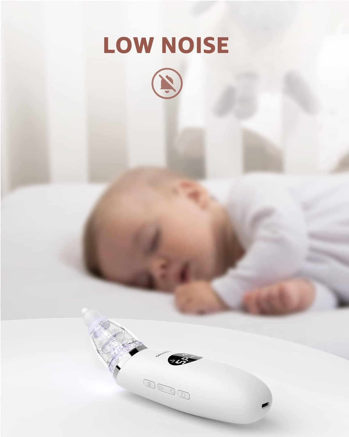 GROWNSY white infant nasal aspirator highlighting low noise operation near sleeping baby.