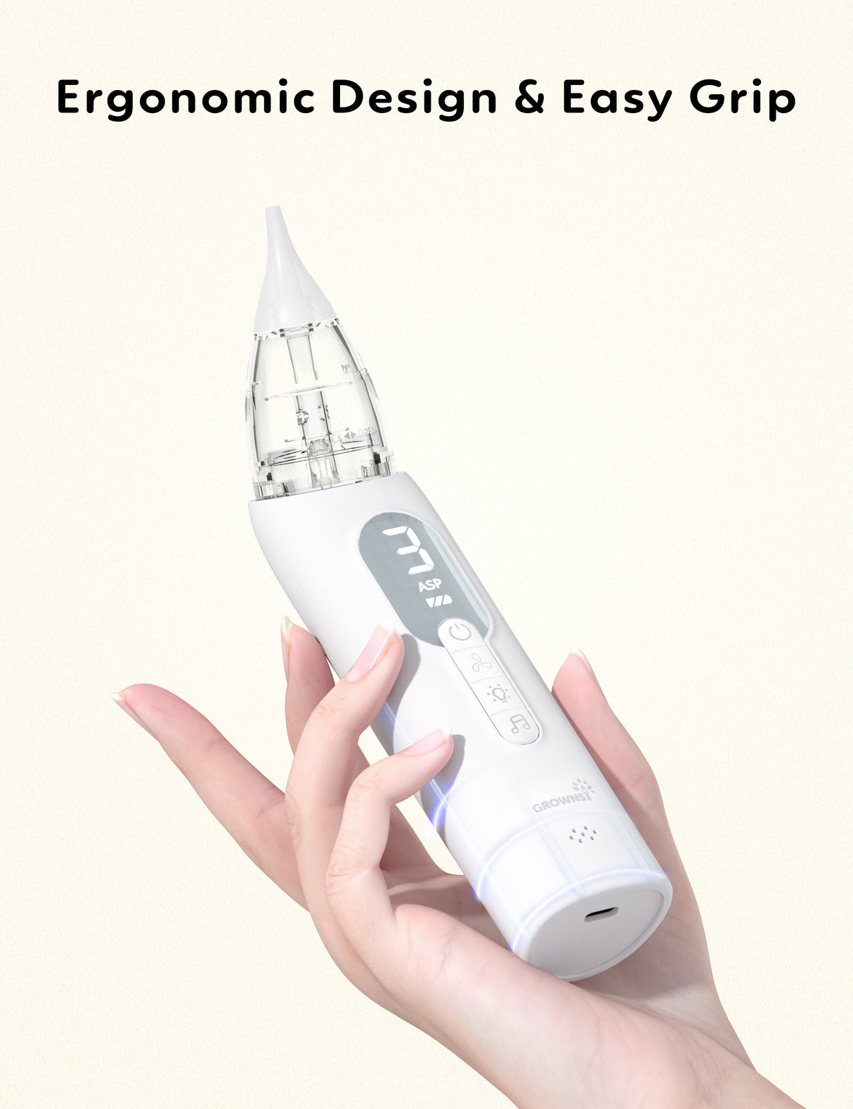 Hand holding a white electric ergonomic newborn nasal aspirator with digital display and buttons.