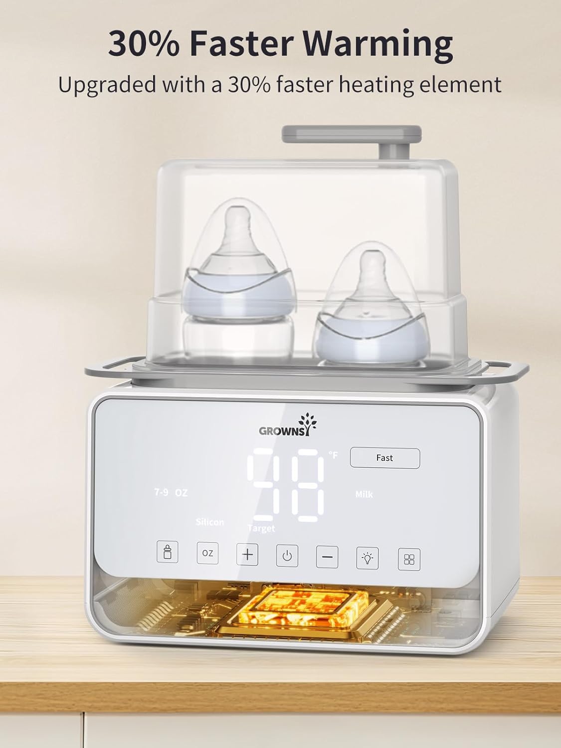 Double baby bottle warmer with digital display showing 98, set to fast mode for quick warming of breastmilk or formula.