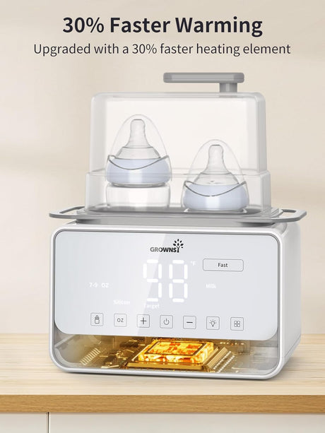 Double baby bottle warmer with digital display showing 98, set to fast mode for quick warming of breastmilk or formula.
