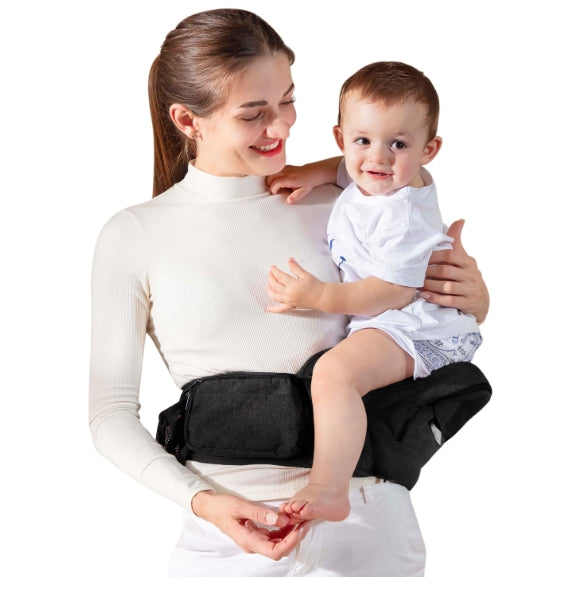 Woman carrying baby in black ergonomic hip seat carrier with adjustable waistband and pockets.