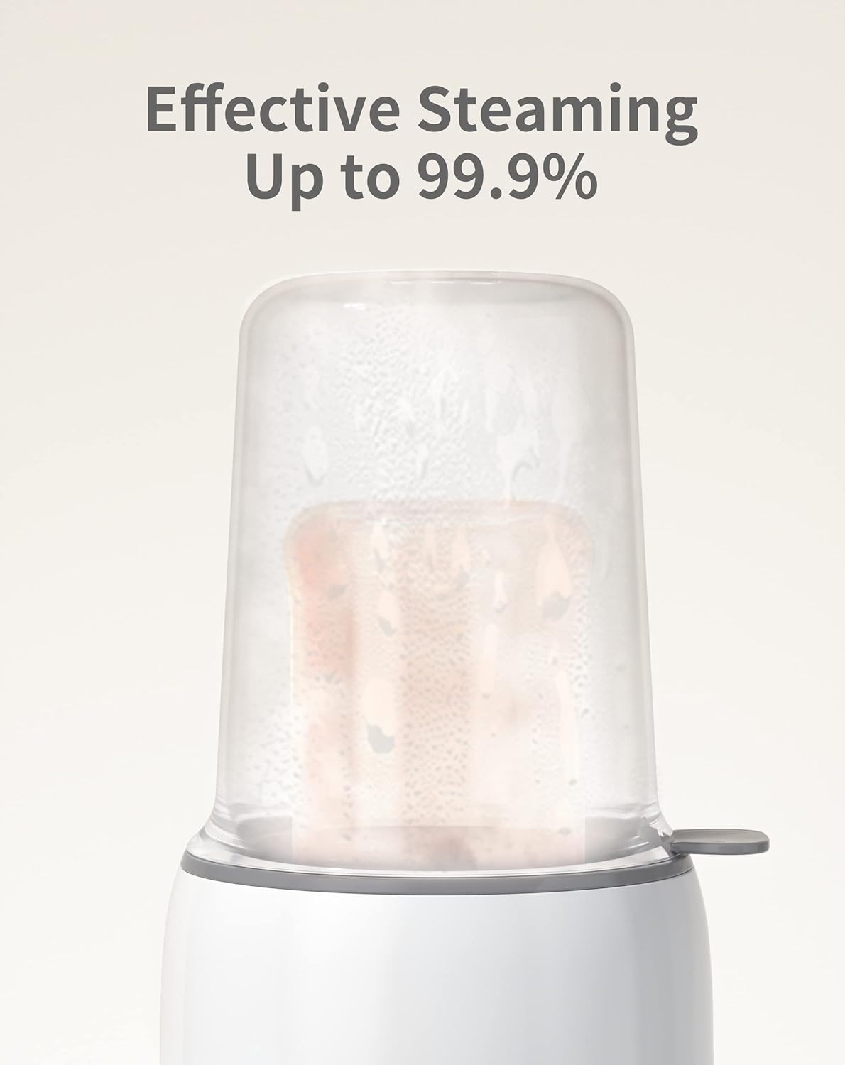 White Parent's Choice bottle warmer with lid, showing effective steam for sanitizing bottles.