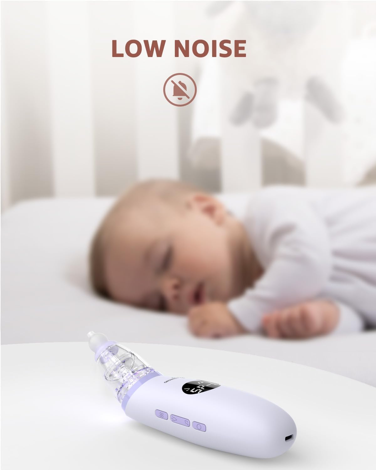 GROWNSY infant nasal aspirator in white and purple, low noise operation near sleeping baby.