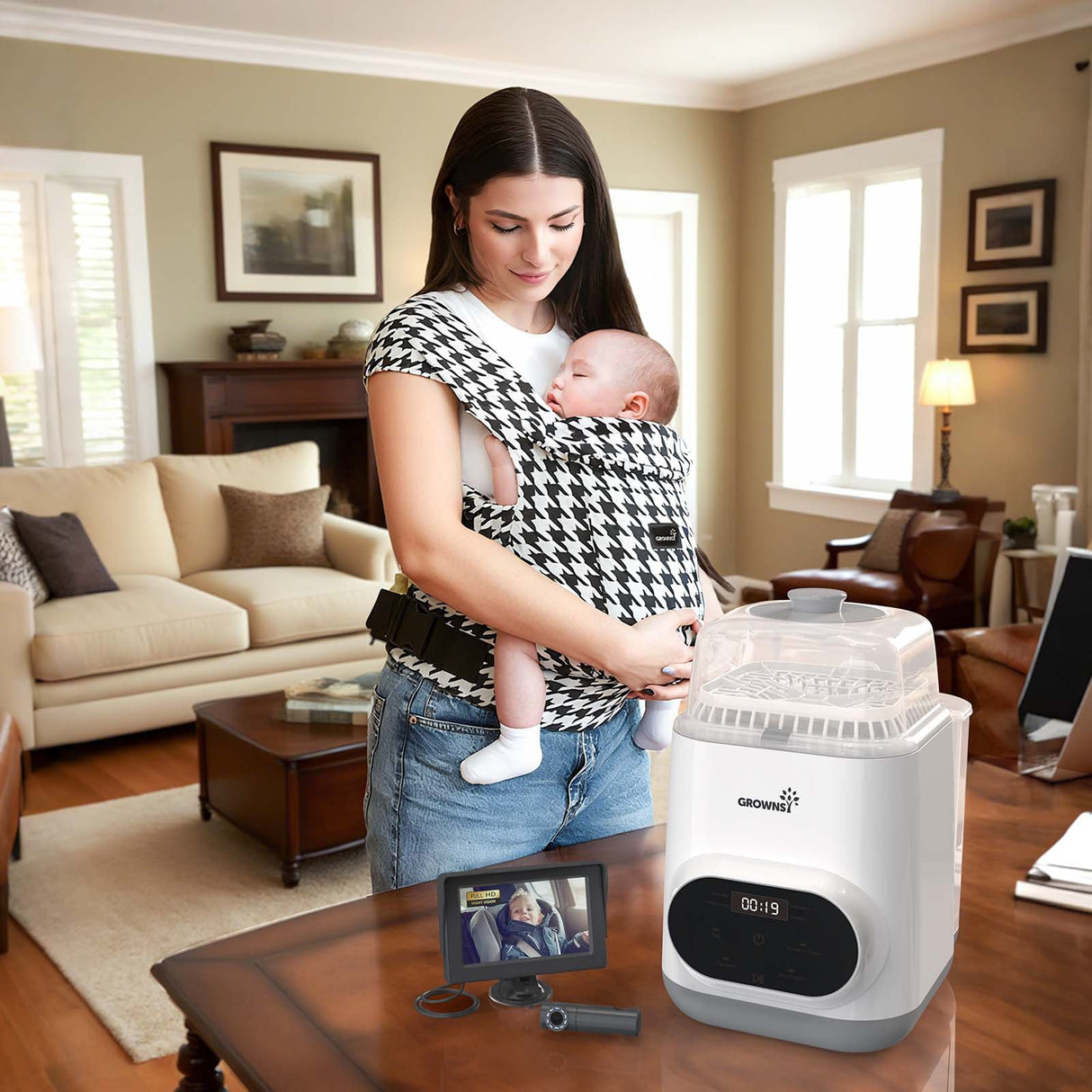 Hands-Free Parenting Essentials Set: Baby in ergonomic carrier, bottle washer, and car monitor.