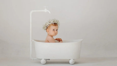 Baby ready to take a bath