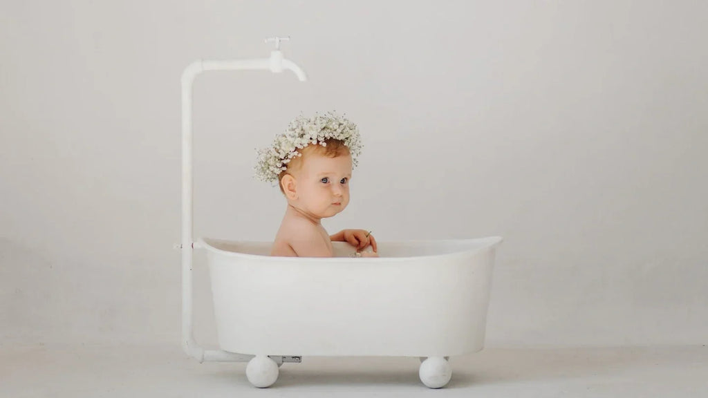 Baby ready to take a bath