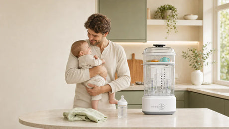dad using baby bottle sterilizer and dryer