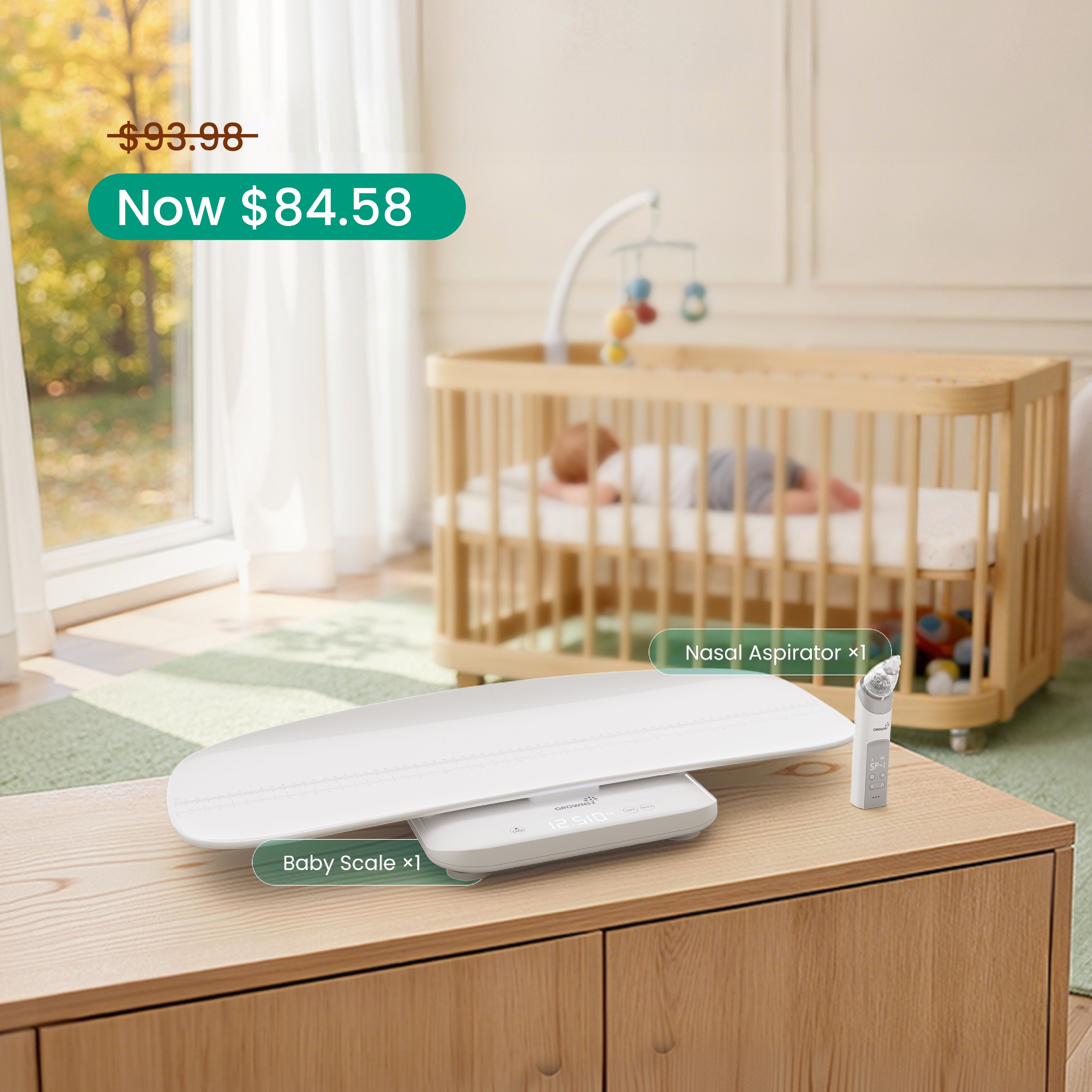 Baby Health Bundle including a white baby scale and nasal aspirator on sale, with baby in crib in background.