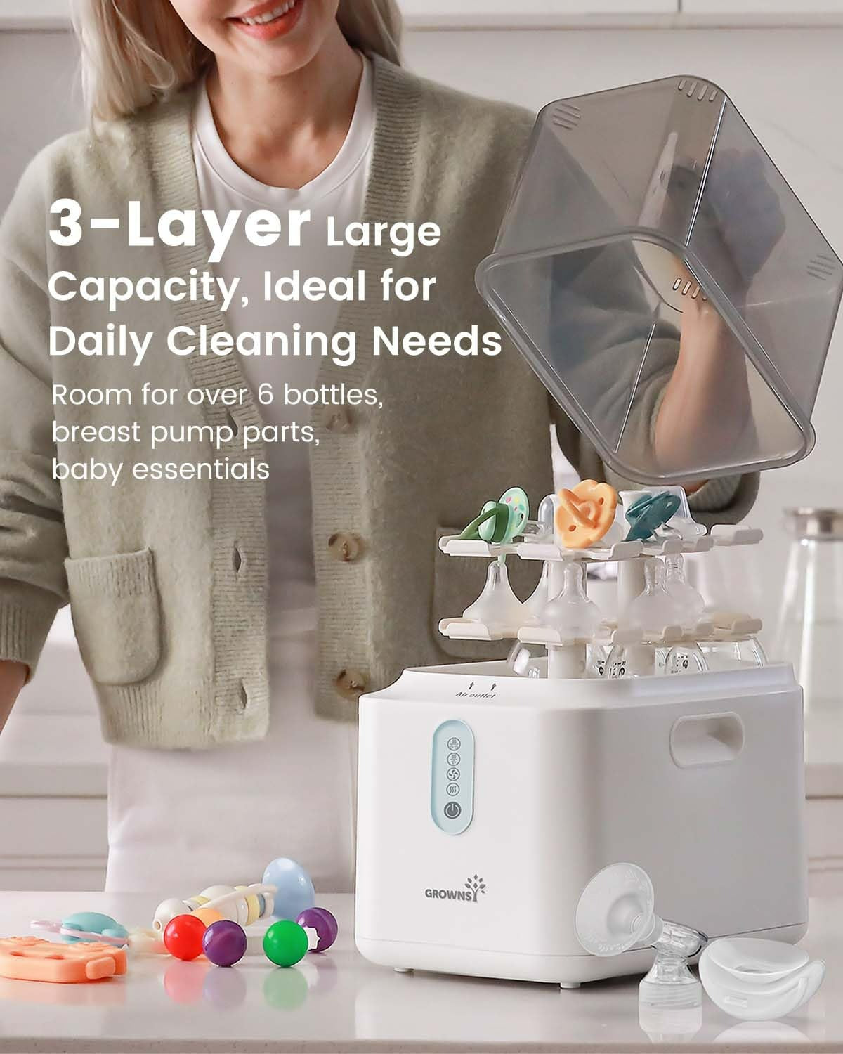 White Grownsy PureSwift sterilizer showcasing 3-layer large capacity for bottles, pacifiers, and breast pump parts.